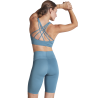 Conjunto de mujer running top técnico y leggings cortos